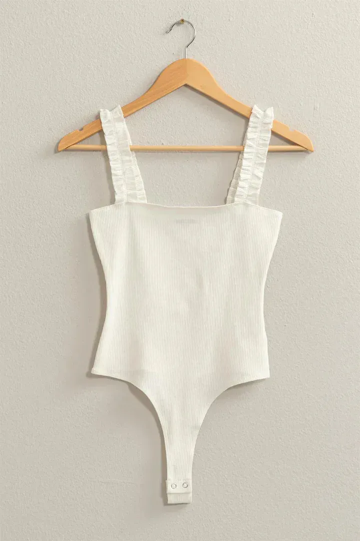 RIBBED RUFFLE STRAP BODYSUIT