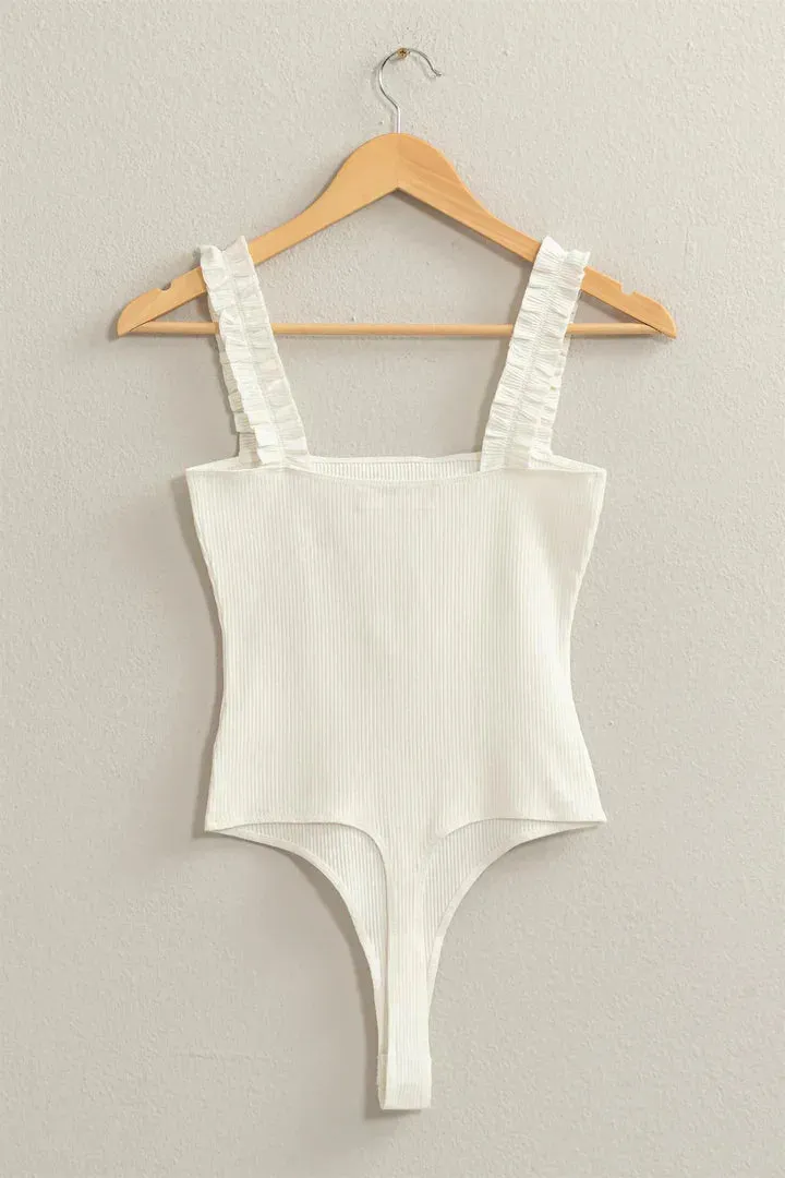 RIBBED RUFFLE STRAP BODYSUIT