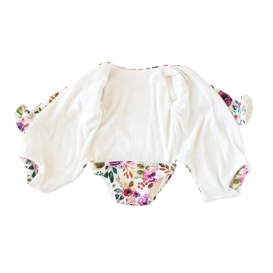 RUFFLE CUFF LONG SLEEVE WINGED BODYSUIT